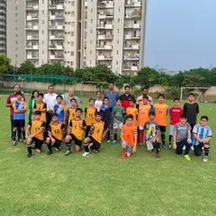 Another shot of the players and coaches from both academies after the U-11 match. We believe in fostering a healthy, competitive community.