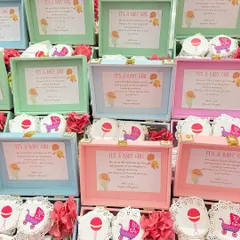 A beautiful assortment of our trunk boxes, ready for a naming ceremony. Each box includes a personalized thank you note for the guests.