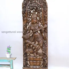 Our 72-inch masterpiece of the Goddess Saraswati, intricately carved with Jali (latticework) design. This large-scale wooden statue embodies wisdom and artistry, making it a profound centerpiece for any space dedicated to learning and culture.