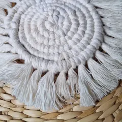 The classic spiraled macrame coaster. I make these with a tight spiral and a fluffy fringe, a perfect little resting spot for your mug.