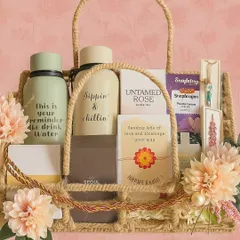 A beautiful Rakhi basket for the best Bhaiya and Bhabhi. It includes matching "Sippin' & Chillin'" bottles, Zara perfumes, a reed diffuser, cookies, and a lovely couple rakhi set.