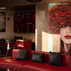 This private entertainment lounge combines a home theatre with a stylish bar area. I used a bold red and black color scheme to create a sophisticated and energetic space, perfect for hosting and relaxation.