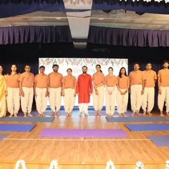 A group photo of the student performers with me after their wonderful yogasana demonstration at our 12th-anniversary event.