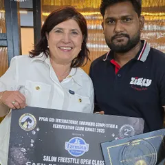 One of our groomers celebrating his 2nd place win in the Salon Freestyle Open Class. These accolades from international competitions highlight the professional skill we bring to every pet we groom.