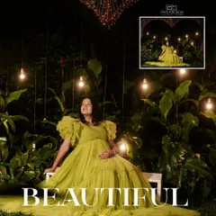 A showcase of our creative night-time maternity shoots. Here, Deepa is seated in a lush garden setting, illuminated by hanging bulbs and a heart-shaped light installation, creating a truly magical and romantic atmosphere.