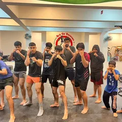 A close up of our members in their fighting stance. You can see the focus and determination in their eyes, reflecting the serious but supportive culture we cultivate.