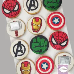 Avengers assemble! These royal icing cookies feature the logos and symbols of favorite superheroes. The clean lines and bold colors make them a hit for any comic book fan's party.