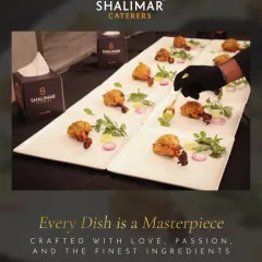 At Shalimar Caterers, we believe every dish is a masterpiece. This image captures the care and attention to detail as our chef plates appetizers, reflecting our passion for the finest ingredients.
