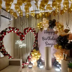 We combined a lush floral heart arch with a modern balloon garland for this grand birthday celebration. The 'Better Together' neon sign adds a personal touch, making it a great backdrop for both birthdays and anniversaries.