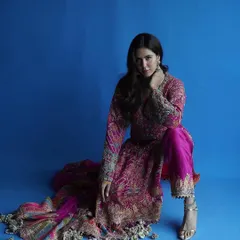This pose showcases the beautiful drape of the dupatta and the detailed embroidery on the trousers. I styled it with simple heels to let the outfit remain the hero.