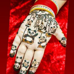 A truly unique and playful design for a panda lover. The entire hand is adorned with adorable pandas swinging from branches, showing that any theme is possible with henna.