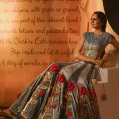 The bride, seated as the protagonist of her own fairytale. The backdrop features a custom-written poem for the couple, an example of the personalized details I incorporate to make your event unique.