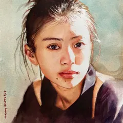 This portrait is a study of how strong sunlight falls across a face, creating a stark contrast between light and shadow. It's these moments of dramatic lighting that can reveal a subject's form and mood.