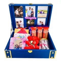 A similar trunk hamper in blue, this one was curated for Valentine's Day and includes chocolates, a teddy, and a jar of "reasons why I love you" notes.