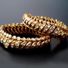 Another view of the magnificent royal heritage diamond and gold flexible bangles. The craftsmanship and history of these pieces make them a true collector's item, offered in our 'Auction of the Week'.