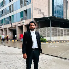 Standing outside the Lawyers' Chamber block at the Rohini Court complex. A lot of my case preparation and client meetings happen in and around these chambers.