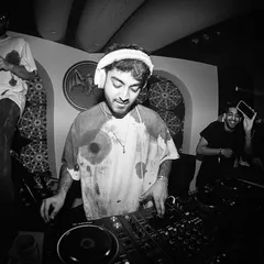 A black and white shot of me enjoying the moment at the Casa Bacardi party. The vibe was just right, and the crowd was with me on every track.