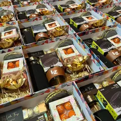 A look at a large-scale corporate gifting order ready for dispatch. These custom boxes are filled with branded items like tumblers and jars, showing how I handle bulk requirements with attention to detail.