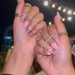 This set is a Bollywood dream. I started with a blush-pink base and loaded it up with colorful jewels, gold accents, and 3D elements. It's a dramatic, main-character look that sparkles under any light.