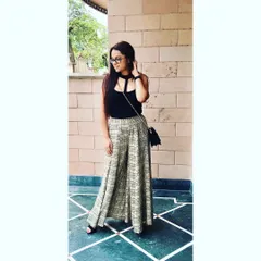 My look for an important client meeting, blending professionalism with personal flair. The wide-leg palazzo pants are a statement piece, while the fitted top keeps the silhouette sharp and modern.