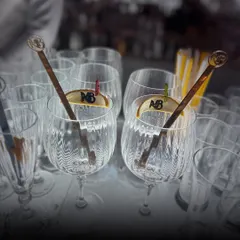 We offer custom stirrers and garnishes featuring your initials or logo. These small, elegant details add a layer of sophistication and personalization to every drink served.