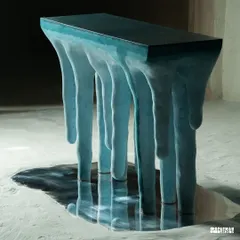 The Ice Bloom console, captured here in its full form, is a testament to translating a fleeting natural moment into a lasting concrete sculpture. The dripping legs and cool blue tones create a sense of frozen motion, making it a true statement of functional art.