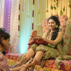 A candid moment during a bridal mehendi session. It's a long process, but we make sure the bride is comfortable and happy.