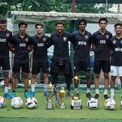 The SG5 coaching staff, a team of professionals committed to player development.