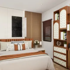 A bedroom design that combines warm wood tones with a modern art piece and elegant lighting, creating a cozy yet stylish retreat.