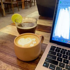 My ideal weekend: finding a nice aesthetic cafe to get some work done, fueled by good coffee. Here I am at Okiru Cafe, planning client programs.