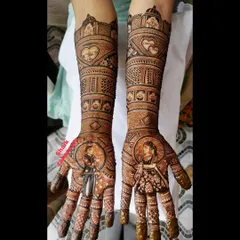 This engagement mehendi is personalized with the couple's portraits and a heart motif. It's a romantic design that tells a story, perfect for celebrating your union.