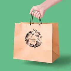 A brand's identity extends to its physical presence. This is a sample of sustainable packaging, a shopping bag made from FSC certified recycled heavy paper, demonstrating my commitment to creating eco-friendly brand assets without compromising on quality.