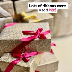 We believe the final touch matters. For our custom gift boxes, we often use beautiful ribbons in various colors to match the theme of your event or celebration, adding a touch of elegance to the eco-friendly packaging.