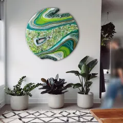 My "Forest Within" artwork installed in a client's home. The shades of green and earthy textures are designed to bring a sense of calm and nature indoors, complementing the surrounding plants perfectly.