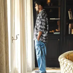 This shot, taken in Gwalior, places the H&M outfit in a real-world, travel-oriented setting, blending fashion with exploration.
