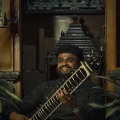A happy moment at home with my instrument. My sitar is an extension of me, and we are ready to create music together.
