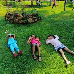 Relaxing on the grass after a fun day of play. Our day trips are a great opportunity for our little Asters to unwind and bond with their friends.