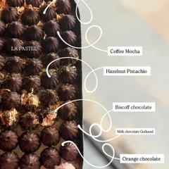 For Ganesh Chaturthi, I offer a premium range of fusion chocolate modaks. This menu shows some of my most popular flavors like Coffee Mocha, Biscoff, and White Chocolate Gulkand.