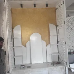 This is a behind the scenes look at the creation of a custom Mandir. You can see the raw structure before the final finishes are applied. This stage is critical for ensuring the foundation and detailing are perfect, transforming raw materials into a divine and charming space.
