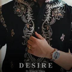 The soul of my work is in the details. This close up view reveals the meticulous embroidery on a custom black kurta. Each thread is purposefully placed to create texture and depth, transforming the garment into a piece of luxury craftsmanship.