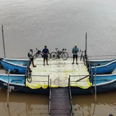 Getting ready for a river crossing with our bikes on a local ferry in Gokarna. These little adventures are part of what makes our tours so memorable.