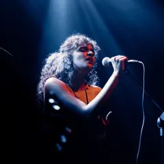 Lost in the music under the stage lights. There's nothing like the connection you feel with the audience during a live concert performance.