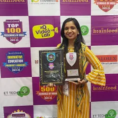 Holding our awards with pride. This recognition fuels our passion to keep getting better and to provide the best possible learning environment for future generations.