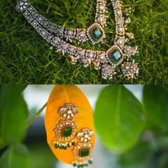 An artistic flat lay of an antique-finish diamond and emerald necklace on lush green grass, contrasted with a close-up of the matching earrings on a leaf.