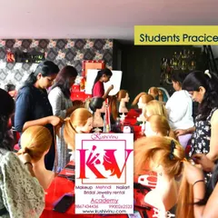 This is what my hands-on hairstyling class looks like. Every student gets their own mannequin to practice on, ensuring they build real confidence and muscle memory for creating intricate updos and bridal hairstyles.