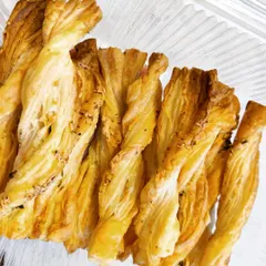 These flaky, buttery, and spicy Chilli Herb Cheese Straws are incredibly addictive. They are handmade in our kitchen and are a perfect snack to munch on at any time of day.