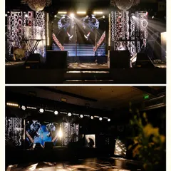 A dual perspective of the stage and dance floor. The top view shows the full, dramatic impact of the layered backdrops and chandeliers, while the bottom view captures the moody, club-like atmosphere created by the interplay of light and shadow on the floor.