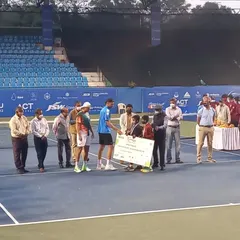 A wide shot of the prize distribution ceremony on the main court at the Bengaluru Open. Our involvement in such events showcases our capability to manage sports events at the highest level.