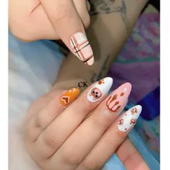 A cute and playful set featuring hand-painted teddy bears, chocolate drips, hearts, and a plaid accent nail.