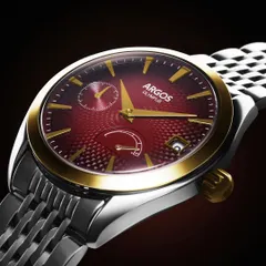 The same watch, a different personality. Here, we focused on the rich red of the dial, using warm light to bring out the gold accents. This shows how lighting can completely change the mood of a product, from cool and technical to warm and luxurious.